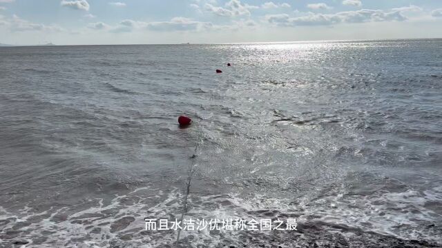 百日自驾三(218)大连仙浴湾海滩滩涂平坦、水质洁净、沙细坡缓,是难得的游乐胜地