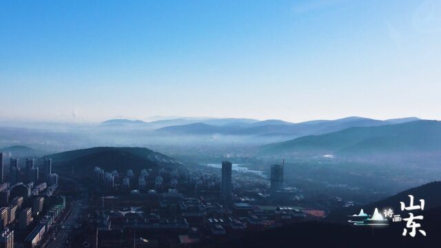 诗画山东丨气温回升风力小,枣庄城市上空薄雾笼罩