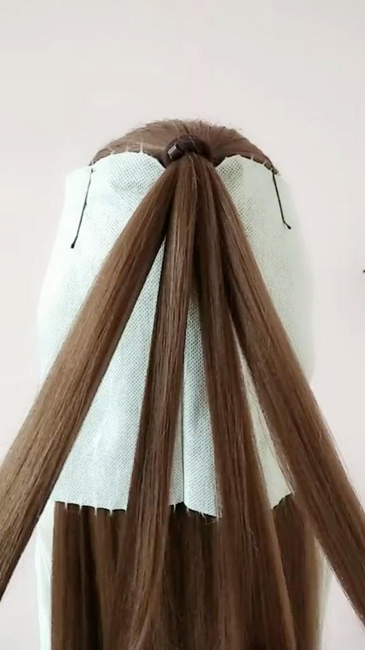四股辫,很有立体感,要仔细看哦