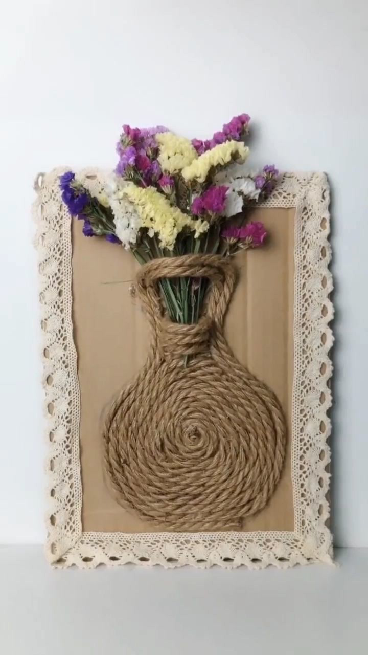 麻绳跟花朵制作的漂亮墙饰