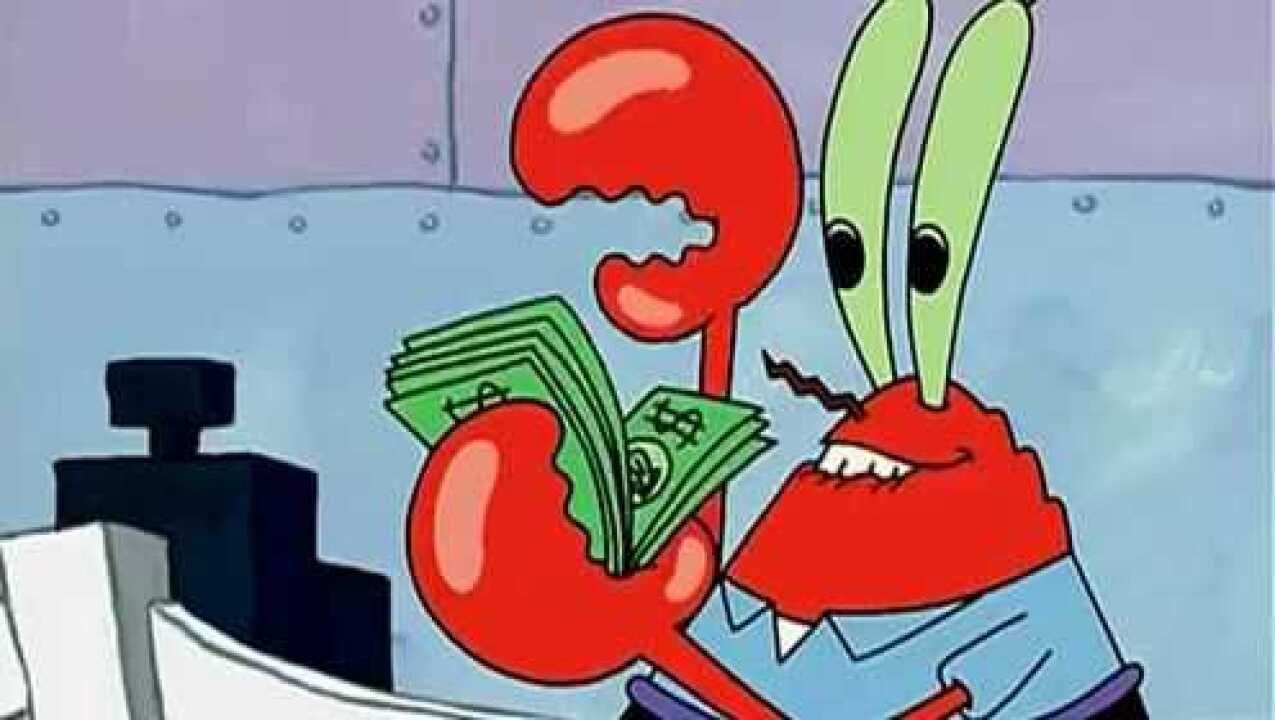 海绵宝宝蟹堡王餐厅里蟹老板正站在收银台数钱