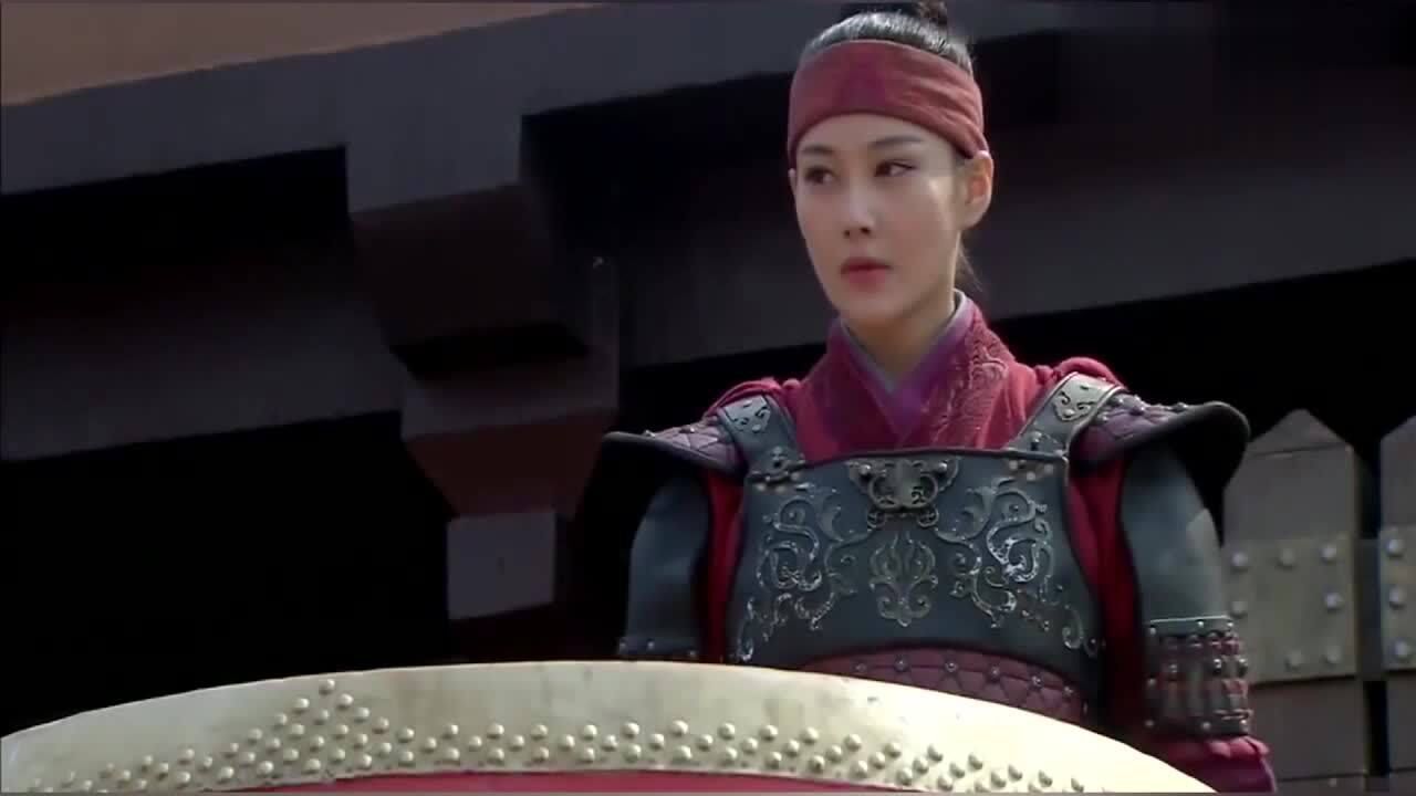 巾帼英雄梁红玉亲自击鼓操兵表明自己要击退金兵的决心