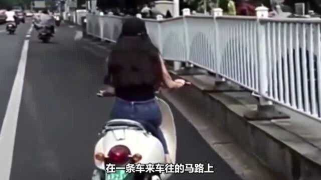 妙龄少妇骑电车当街“漂移”,帅炸整条街,赛车手:自愧不如!