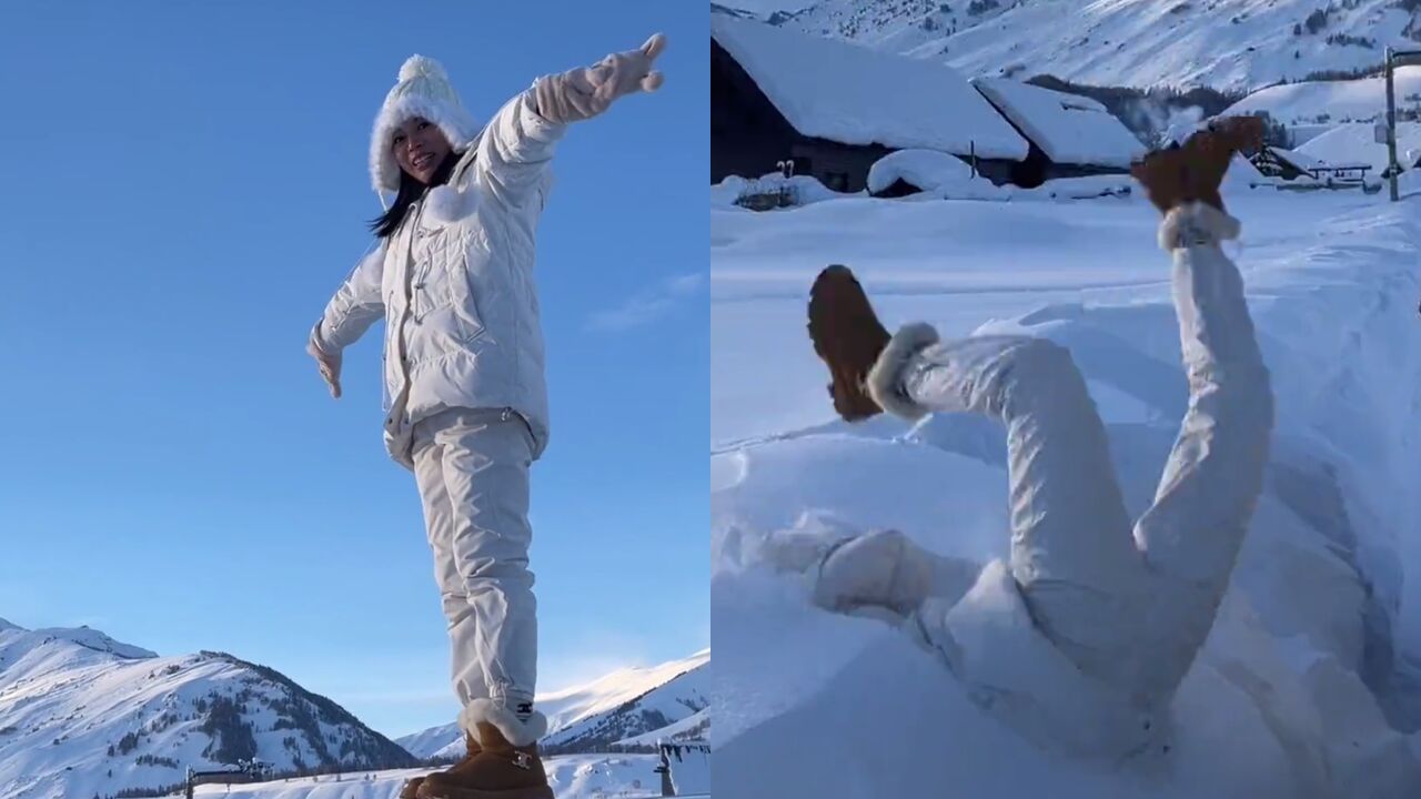 女子本想记录跳雪唯美场面,不料脚滑摔个倒栽葱:用腿比个耶