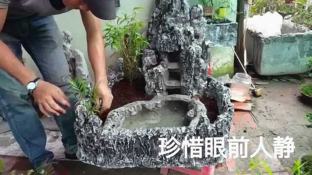 民间高手制作的假山石盆景,形象太逼真,点缀花草绿植,效果迷人