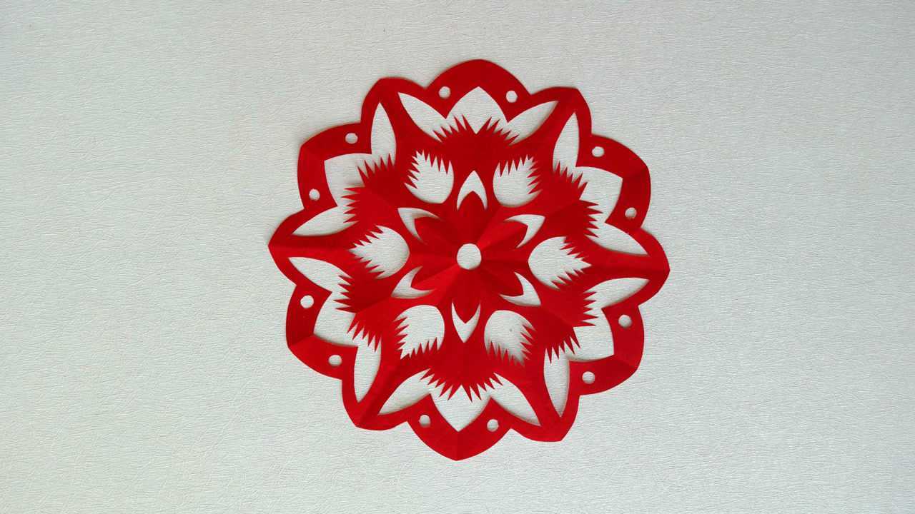 莲花纹团花剪纸,用莲花外形设计的一个莲花纹团花剪纸,很美!