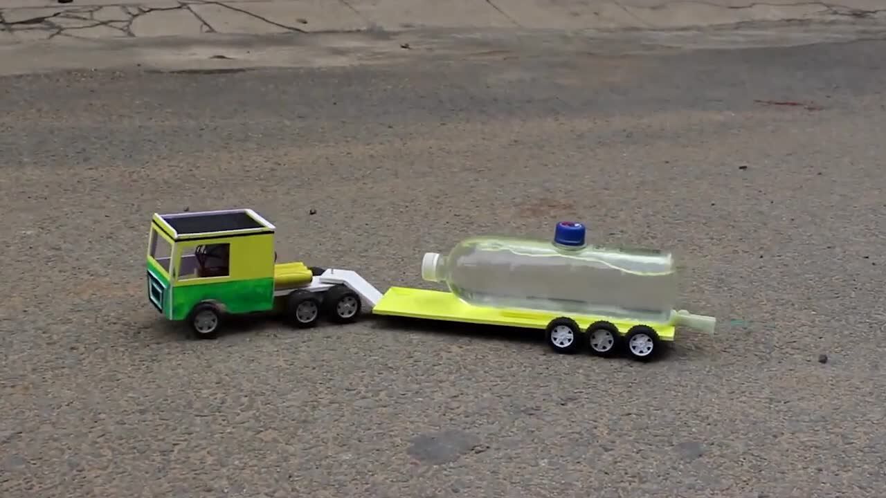 瓶子制作拖拉车玩具图片