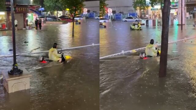 太危险!武汉一女子涉水骑电动车,整个电动车都在水里仍能正常行驶