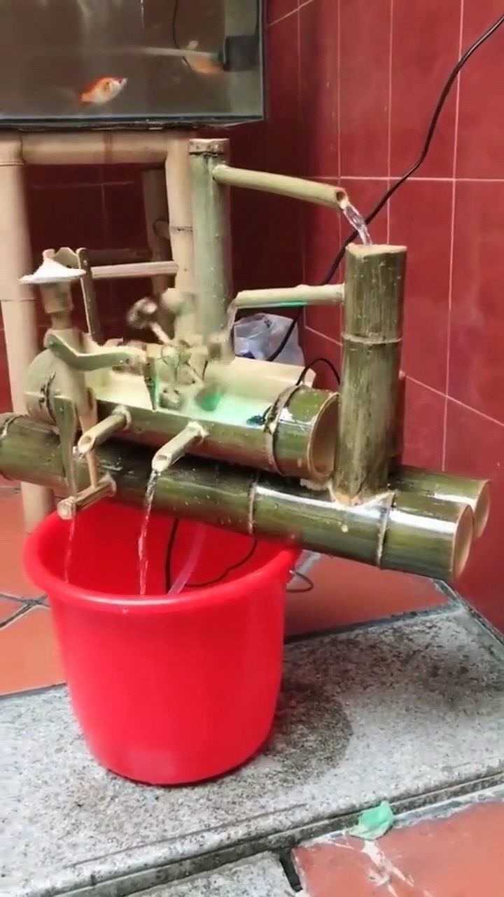 发明高手在民间,竟然用竹子做了个水车,这造型真好看