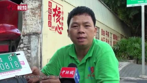广西南宁一残疾男子开修车店自食其力助近200名残疾人就业