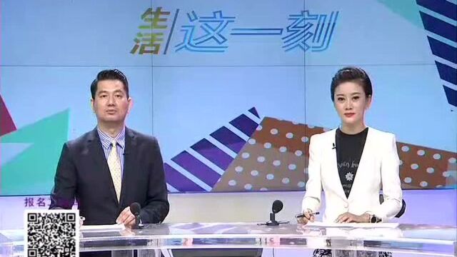 国安社区帮帮忙 居民冒雨排队购物