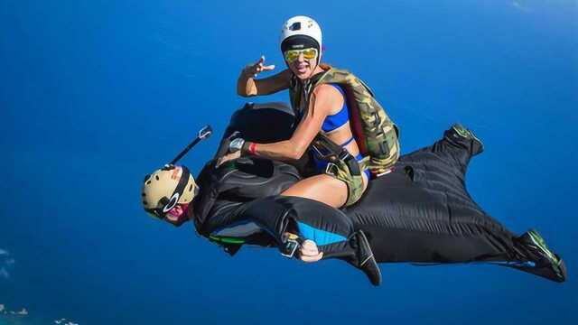极限运动女中豪杰 千米高空骑在男人身上飞