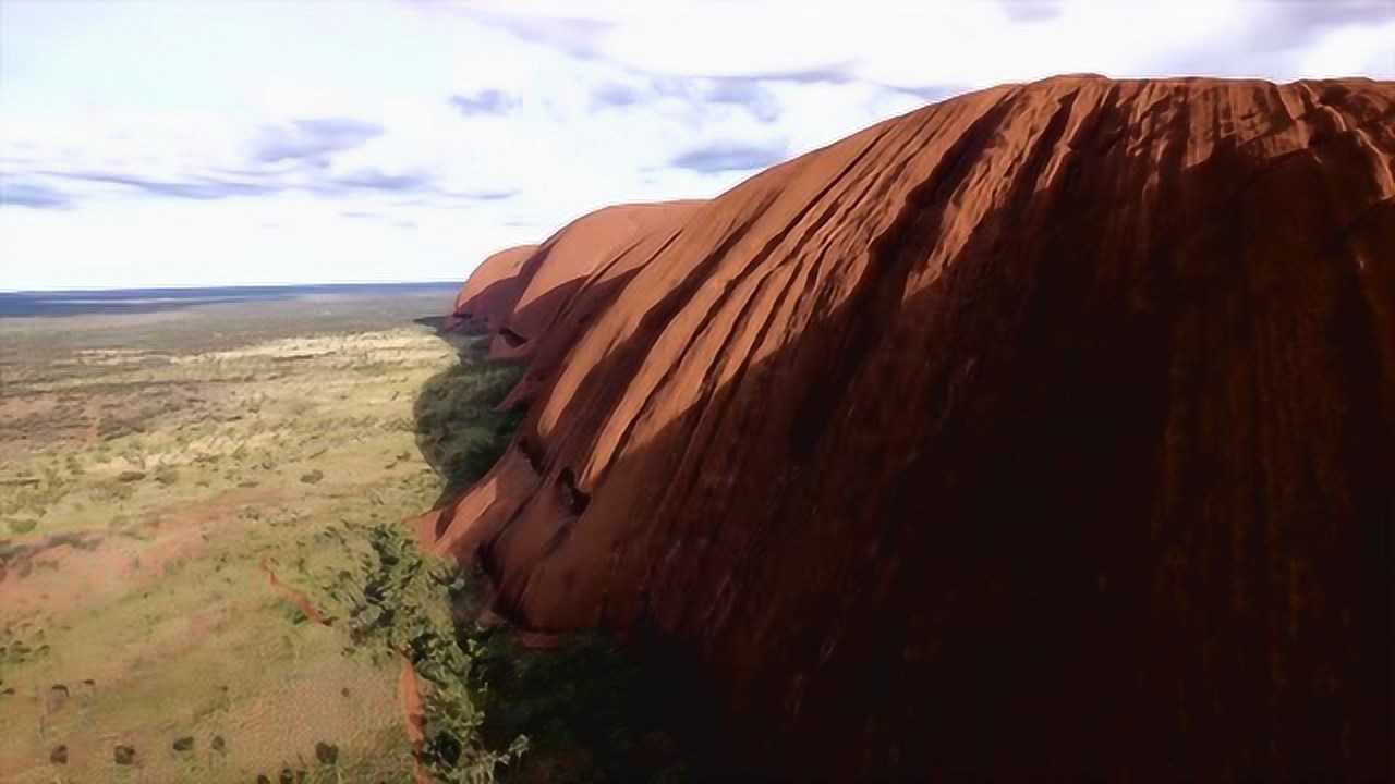 艾尔斯岩又名乌鲁鲁巨石.艾尔斯岩高348米,长3000米