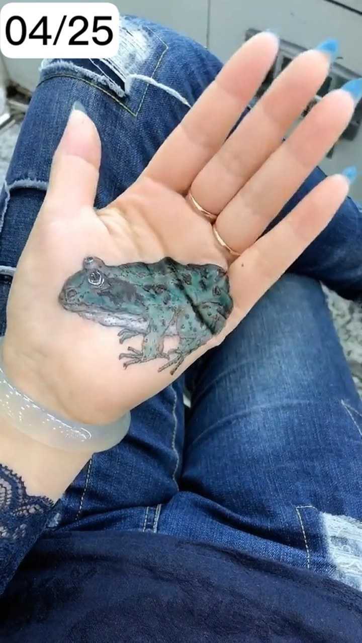 我在手上画的这只青蛙逼真吗?不是贴上去的