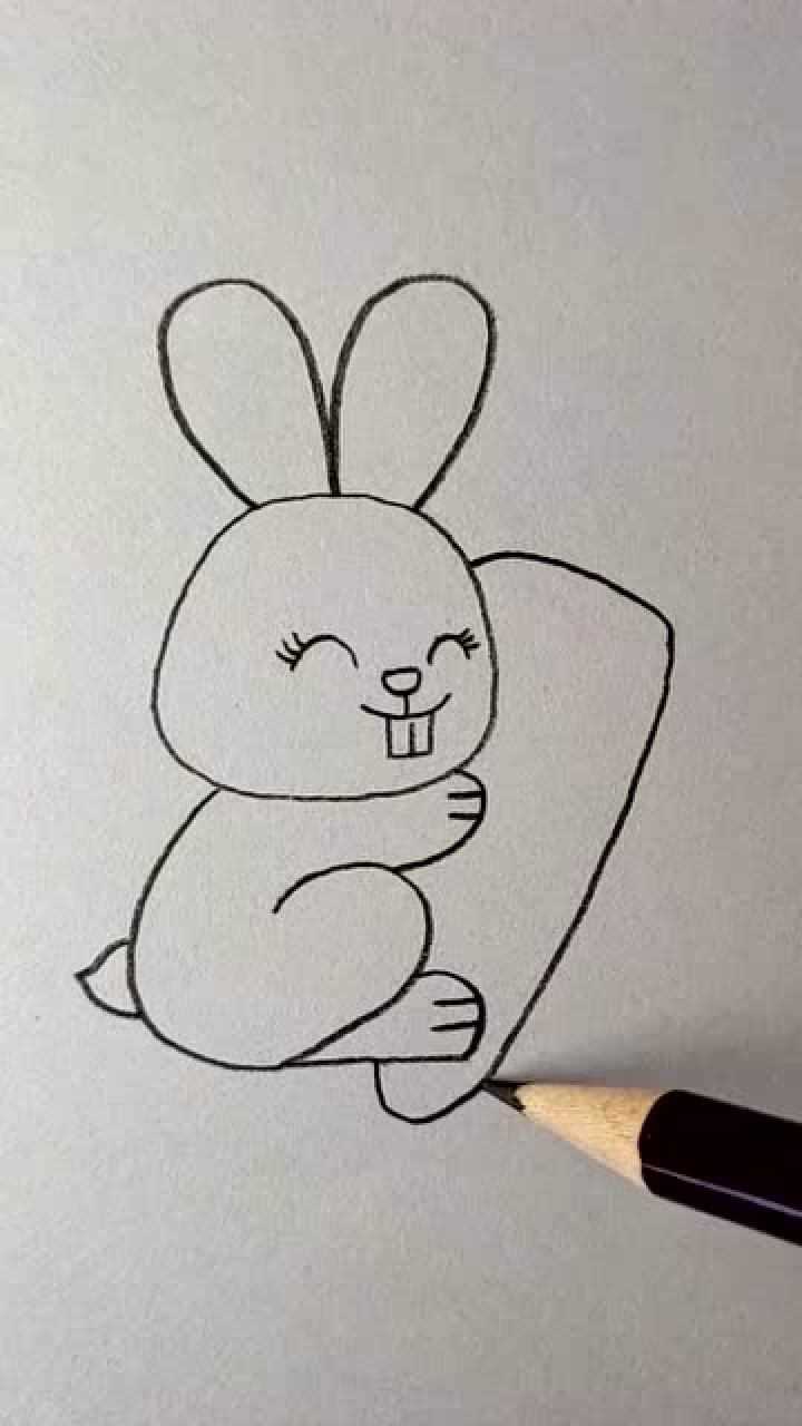 小兔子抱着萝卜怎么画图片