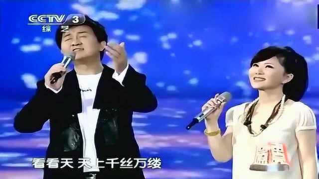 歌手任静和付笛生演唱《雨中恋》含情脉脉,歌声美妙