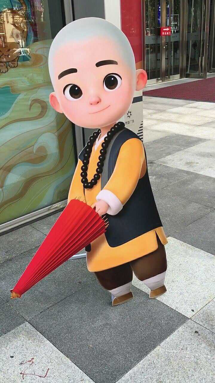 打红伞的小和尚,这形象也太可爱了吧