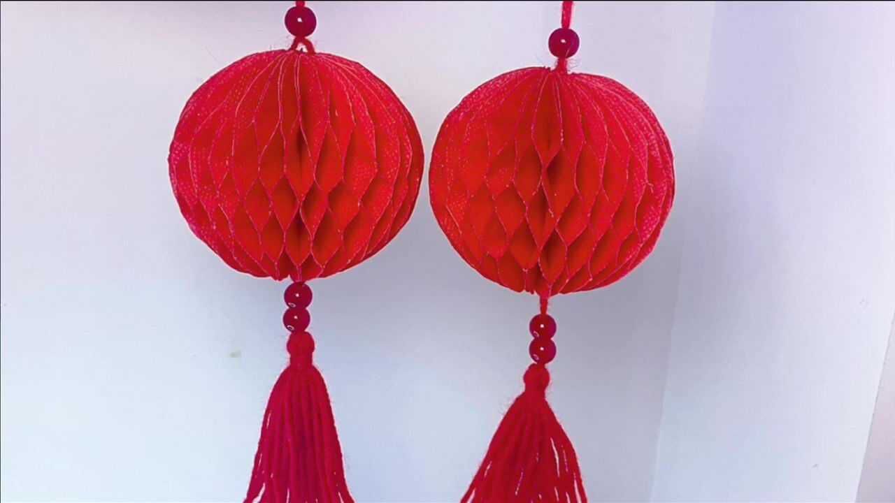 快过年啦用购物袋来做一款精美的蜂窝球灯笼吧特别简单漂亮