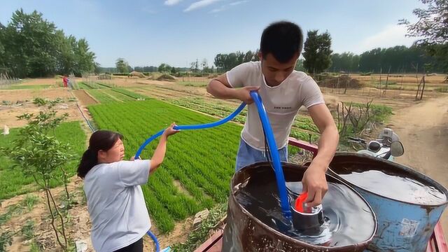 大庆新买一台抽水泵,再配上50米的新水管,这浇地省时省力还方便