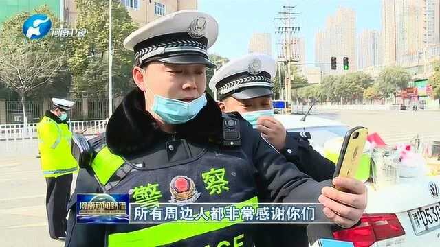 平顶山:爱心市民用绳子为执勤民警送饭