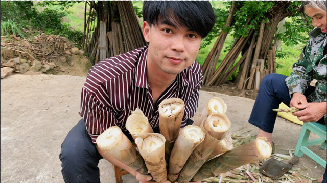 小伙在河边,发现很多又大又粗的白头笋,越拔越起劲