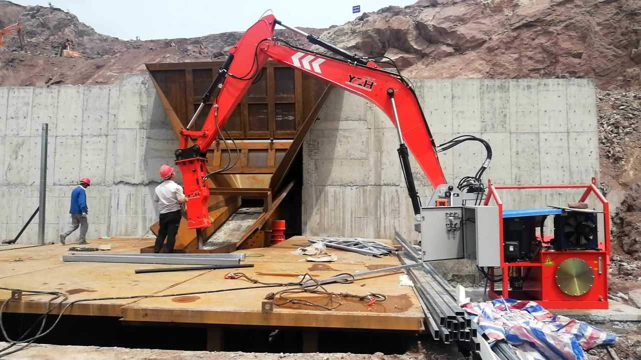 料仓口固定式液压碎石机械臂通常用于矿业,砂石骨料场和采石场,以解决