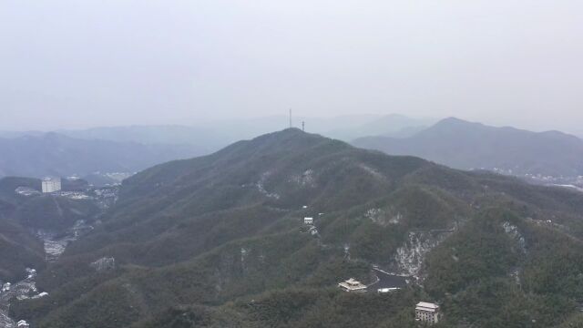 航拍下雪中的益阳桃花江竹海群山与竹林风光