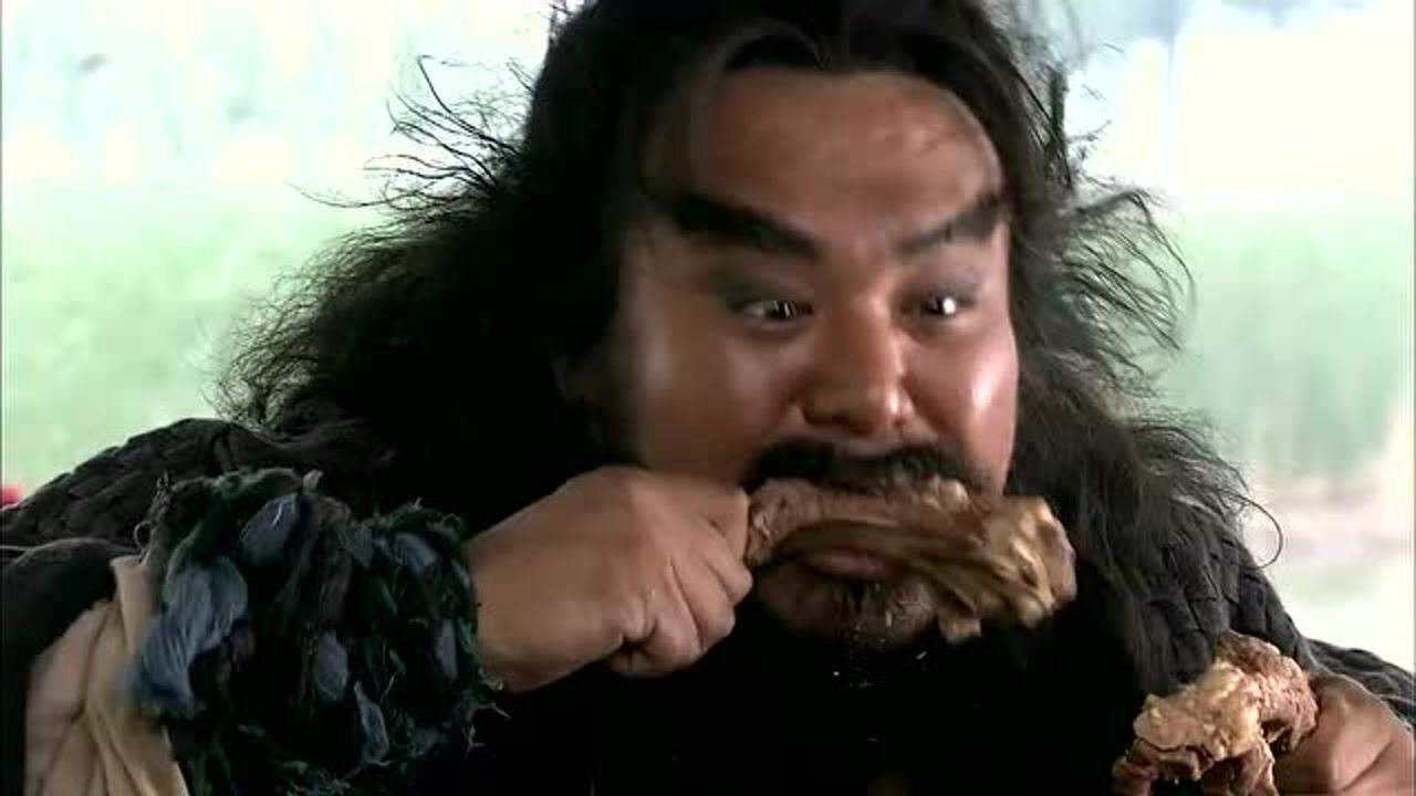 水浒传李逵吃饭场面太高能左手左右齐上阵牛肉羊排往死里吃