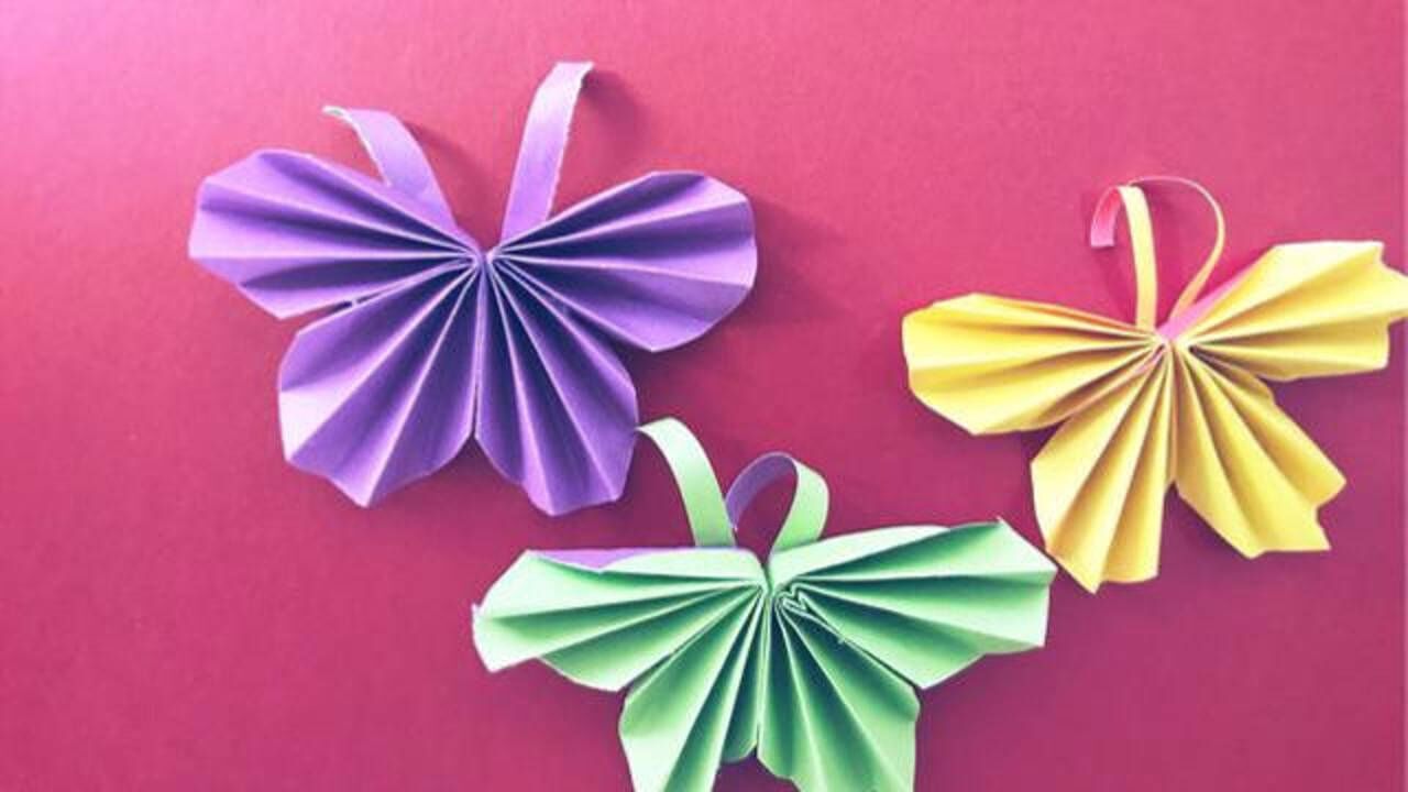 五彩斑斓的蝴蝶折纸萌化小女孩的内心也可以用来装饰房间