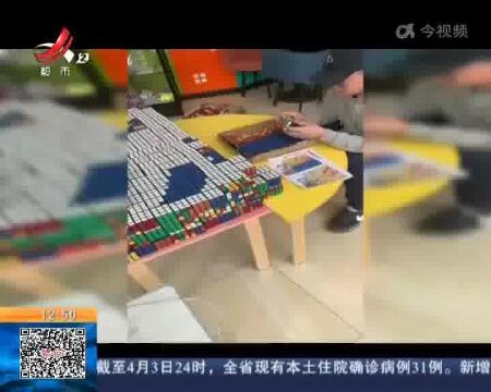 辽宁大连:巨型魔方拼图 向逆行者致敬