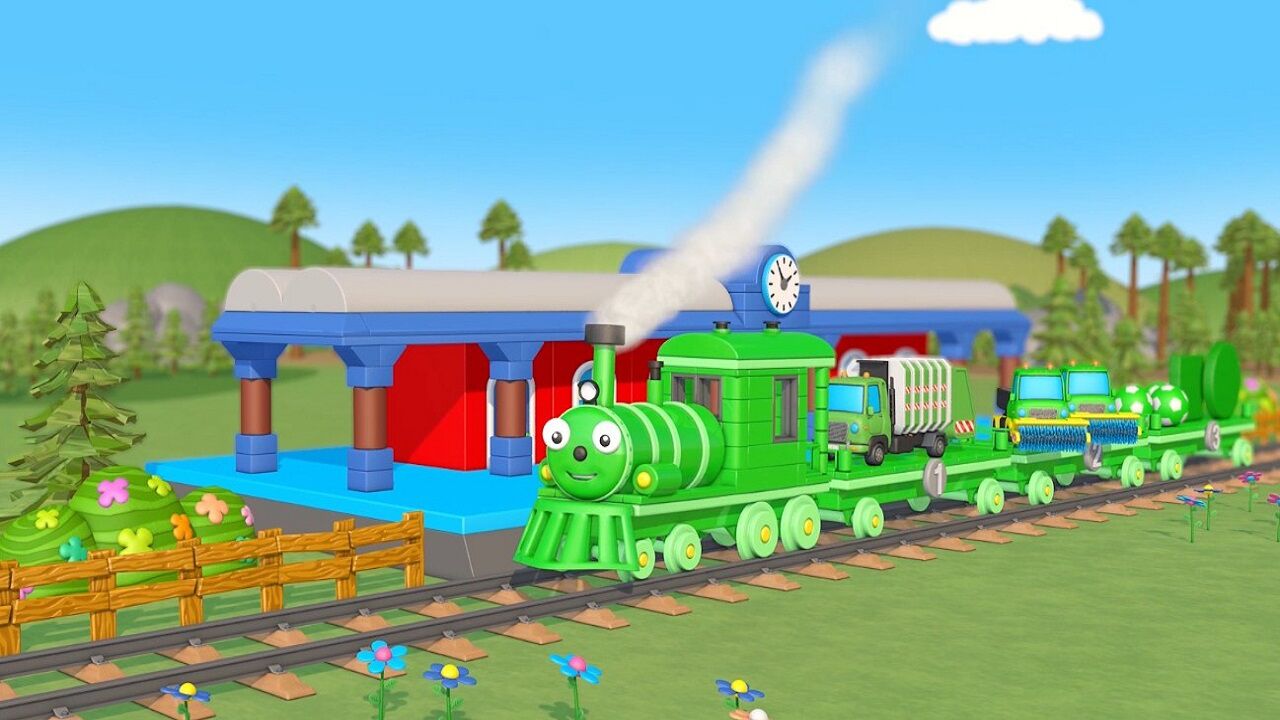 一辆绿色的小火车进站了