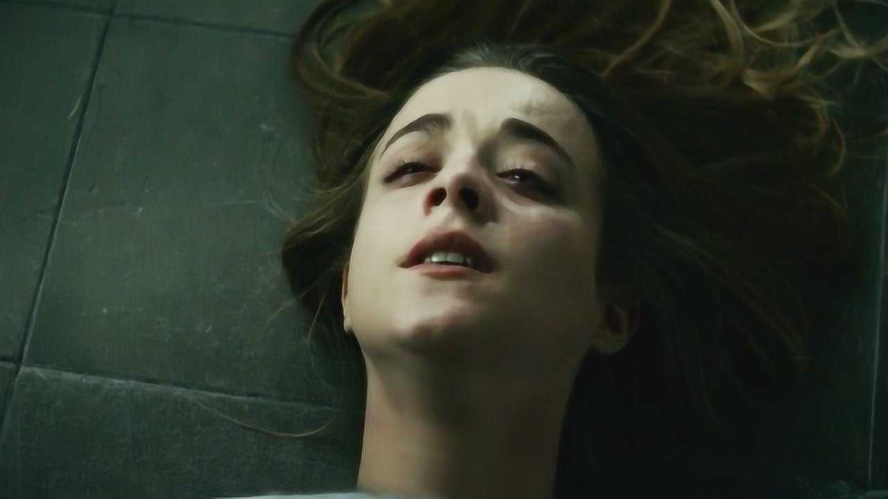 Dramatic movie still teasing a suspenseful storyline about secrets, betrayal and shocking twists