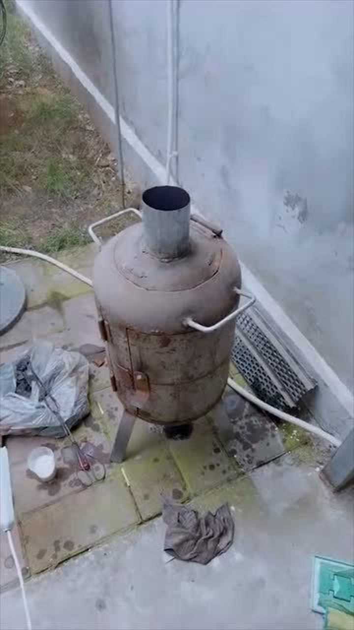 煤气罐改装烧煤炉子图片