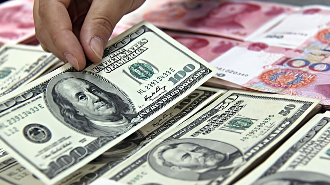 人民币兑美元中间价报6.9967,下调219点