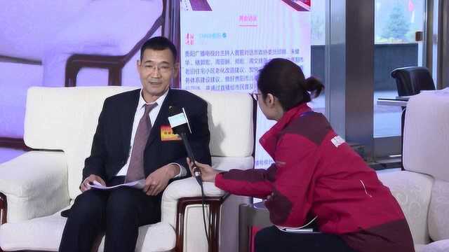 两会微访谈 市人大代表张国华:积极向高端制造、高端消费调整