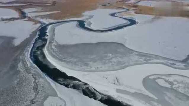 航拍夹边沟水库雪景in酒泉,甘肃视角