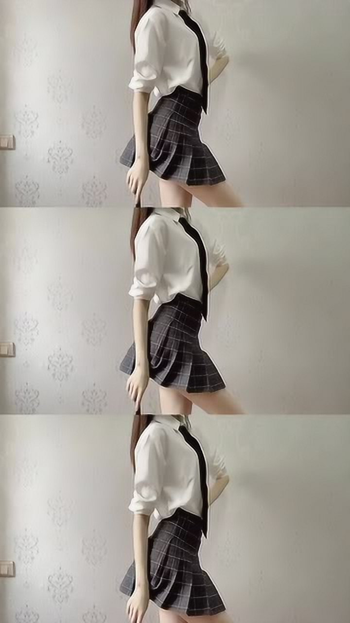 百褶裙小美女扭腰可爱的百褶裙能扭的如此性感