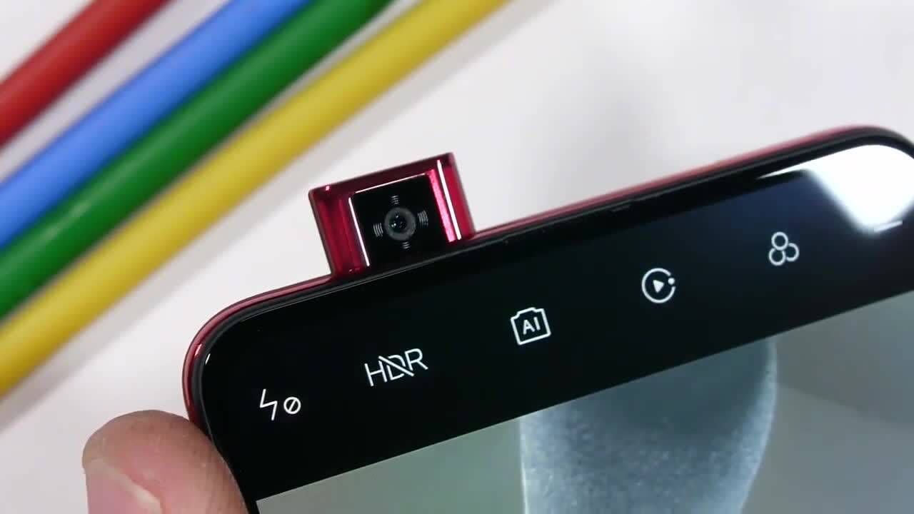 红米redmi,k20,pro升降摄像头特写,用手按住就是不让它出来