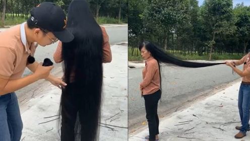 丈夫喜欢长发，女子为爱留发24年不剪，如今长度已有1.65米能拖地