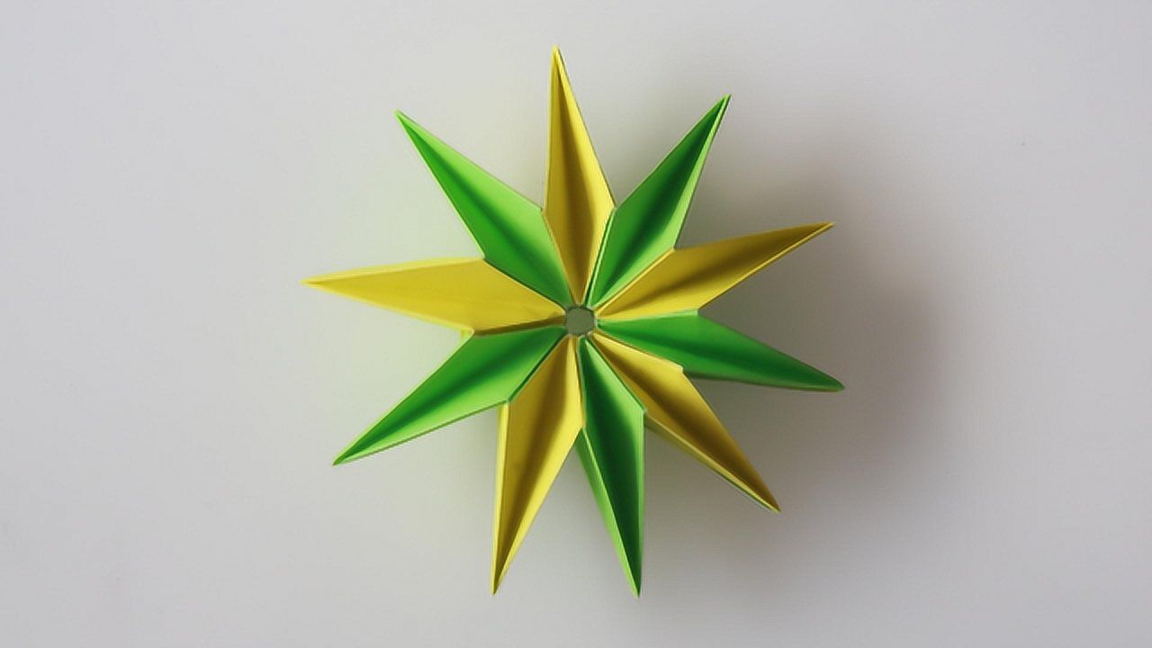 如何折叠一款漂亮的组合十角星,折纸方法很简单,星星