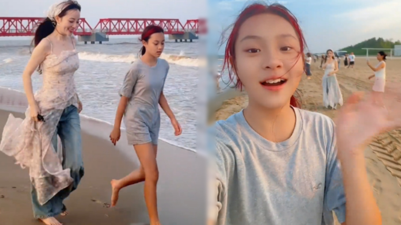 李小璐晒母女海边玩耍视频,被网友说甜馨太黑了土,本人直接回应