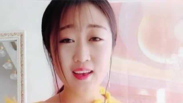 女歌手唱一首《雨一直下》,特别好听,听了一遍又一遍