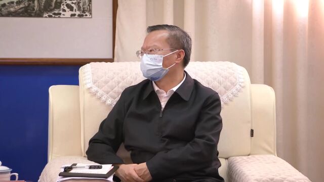 胡忠雄会见中电太极董事长肖月强一行