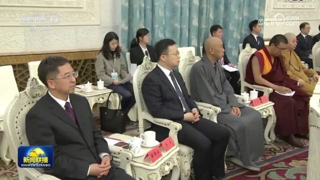 王沪宁会见纪念中国佛教协会成立70周年座谈会代表