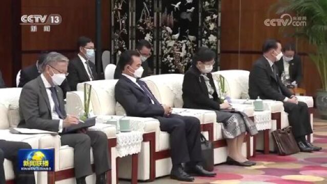 李希看望并会见老挝人革党中央总书记、国家主席通伦