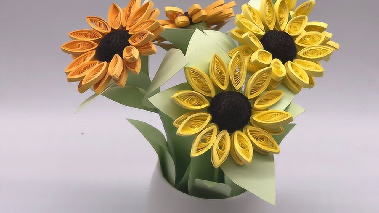 这朵手工制作的衍纸向日葵,你喜欢吗?进来我教你,有视频教程哟