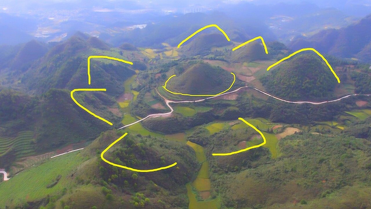 此地重峦叠嶂,大将点兵形,百里挑一的风水宝地