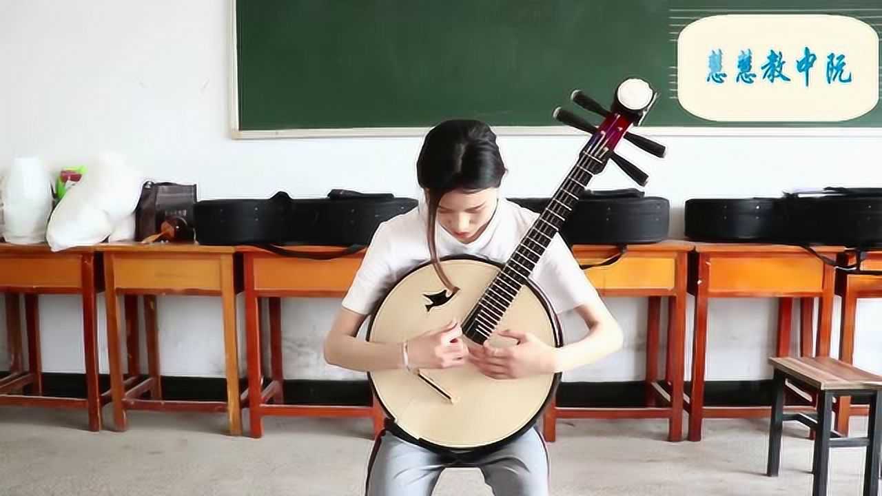 传统乐器中阮教学,今天我们来学习空弦弹挑,以及常见问题