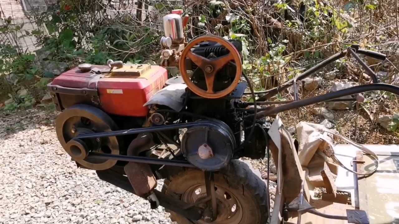 这种桂林农村特有外号叫"狗古冲"的拖拉机,既能拉货又能喷农药