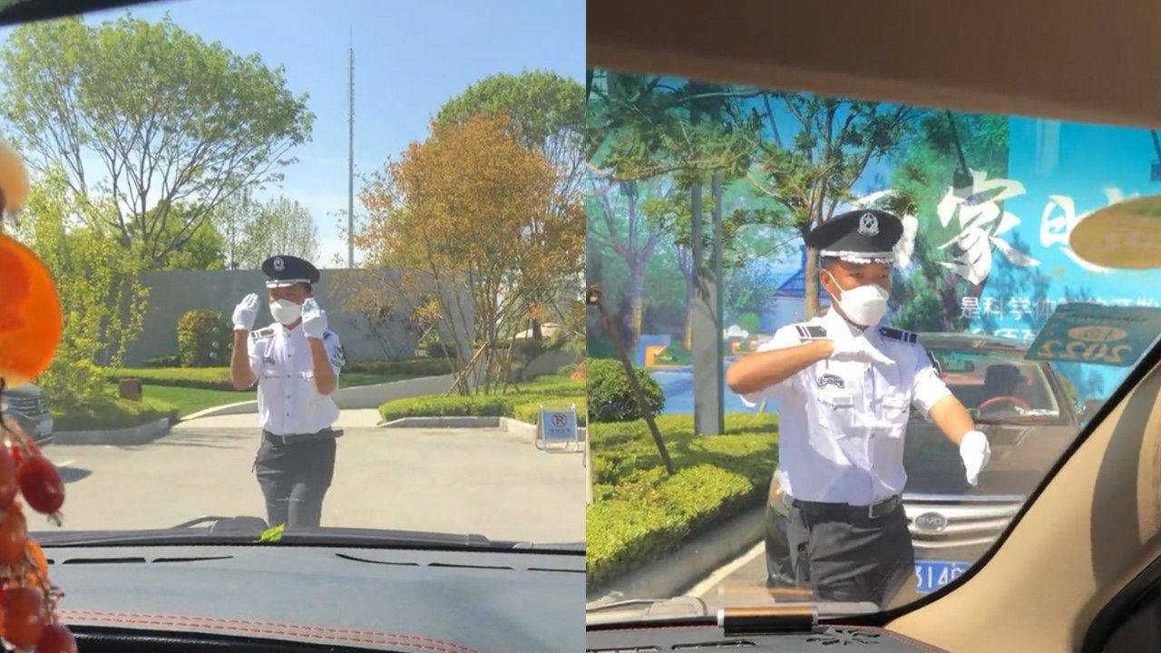 保安環繞式指揮客戶停車,專業手勢令人稱讚:倒車影像成擺設了!